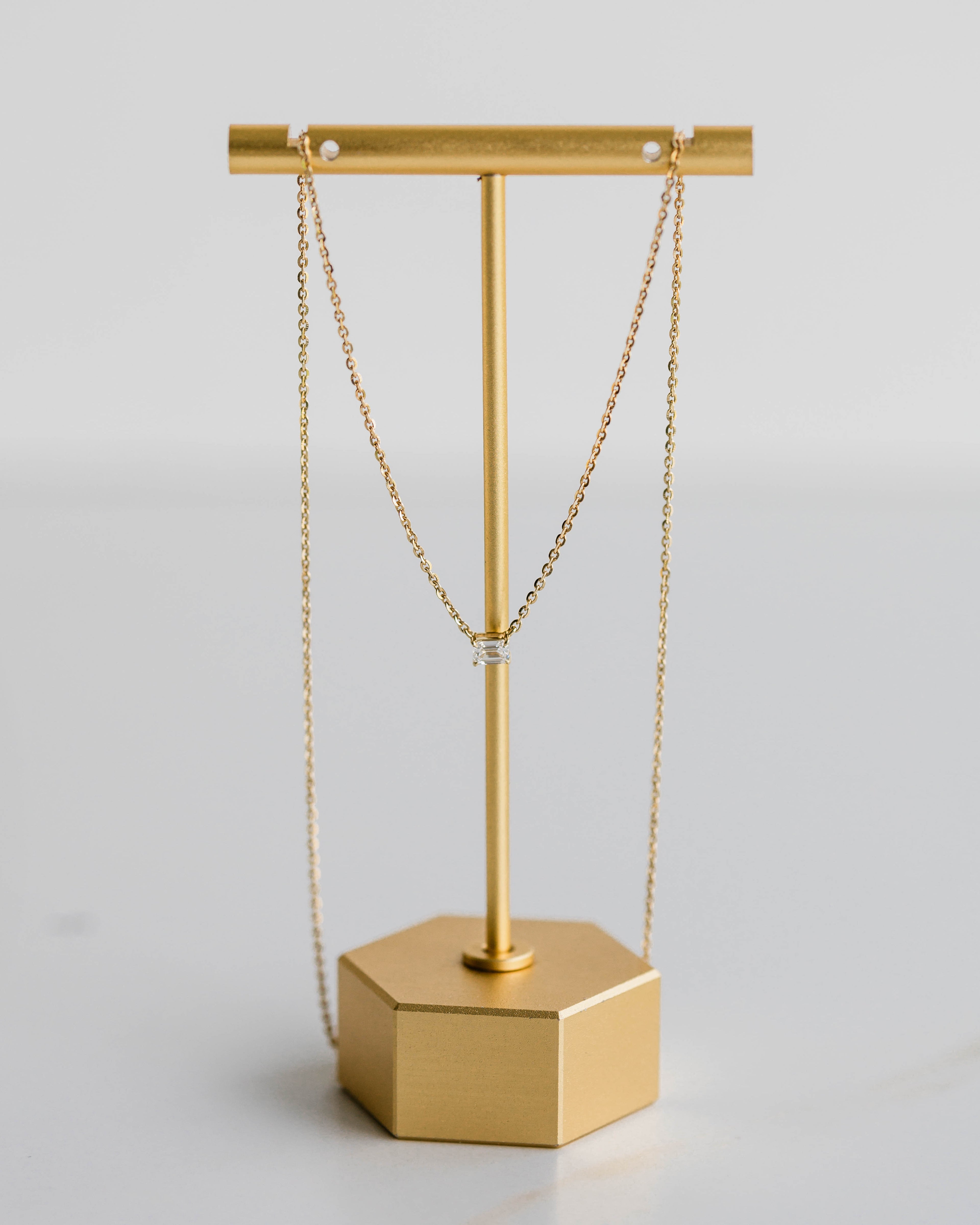 Emerald East-West Pendant — 0.24ctw Yellow Gold